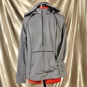 Athletic striped 3/4 zip sweatshirt with thumb holes, pockets and hood!